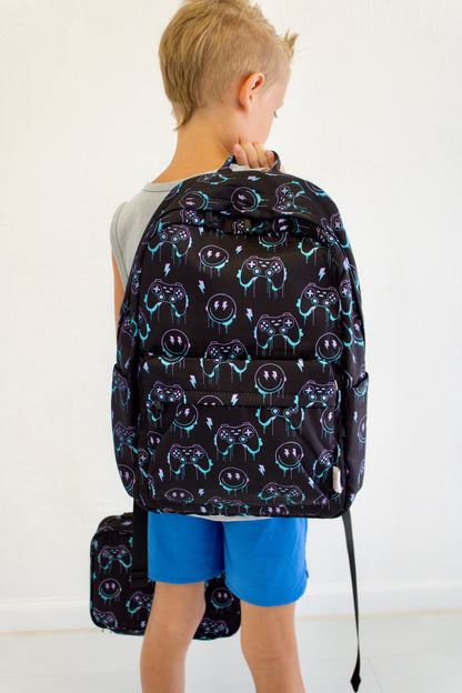Niveau supérieur - Sac à dos et boîte à lunch