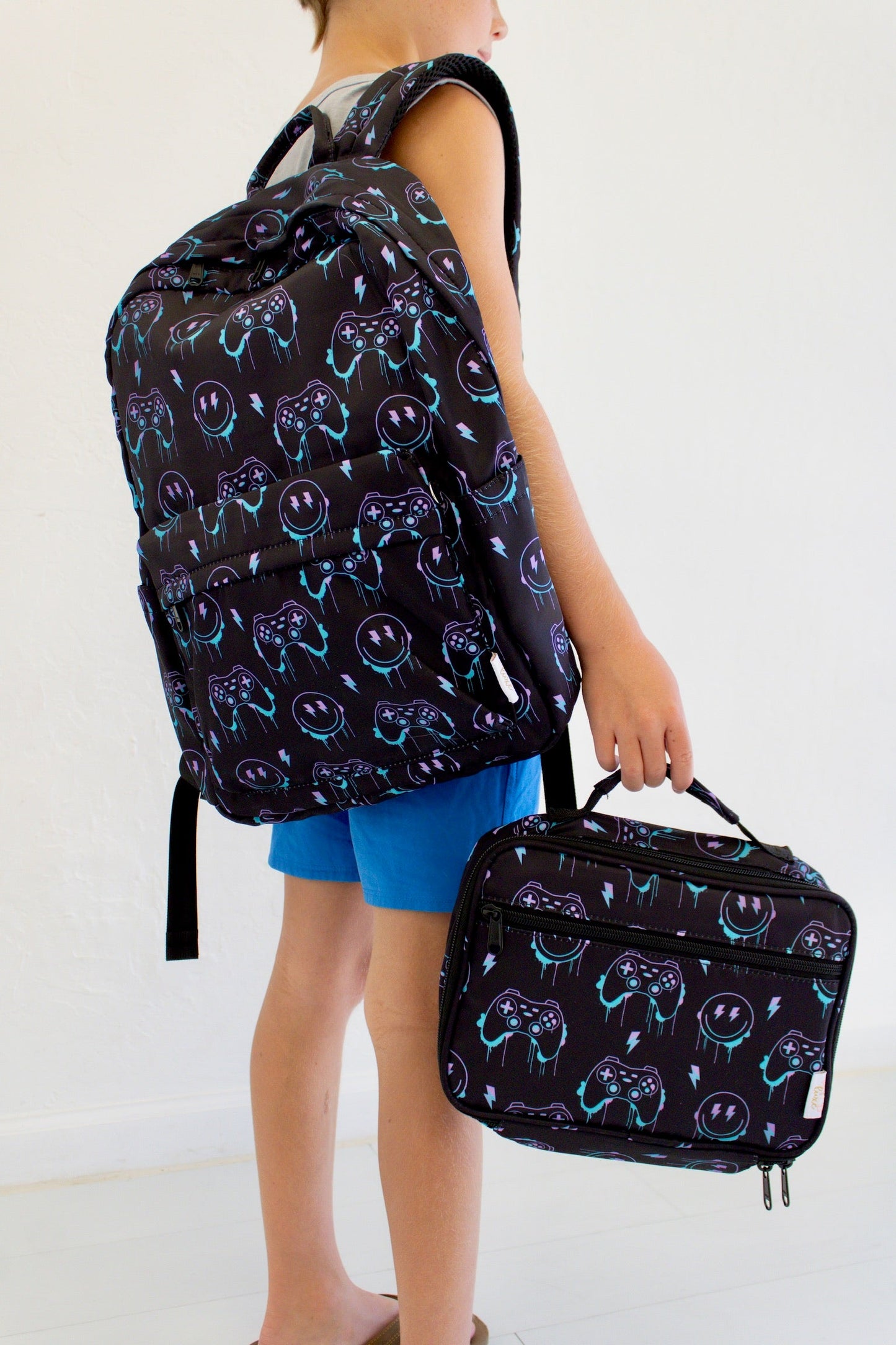 Niveau supérieur - Sac à dos et boîte à lunch