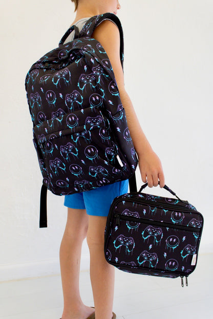 Niveau supérieur - Sac à dos et boîte à lunch