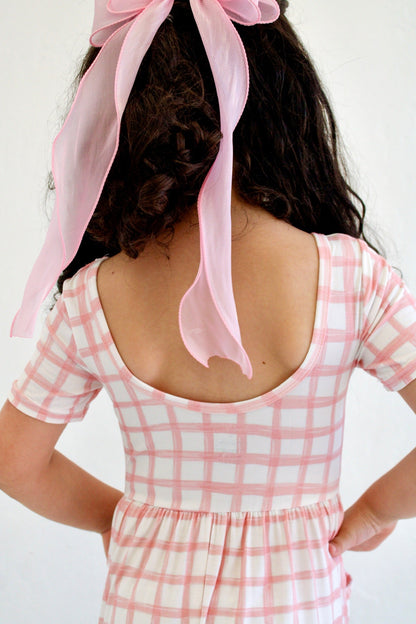 Craquez pour la barboteuse à carreaux Bubblegum Luxe