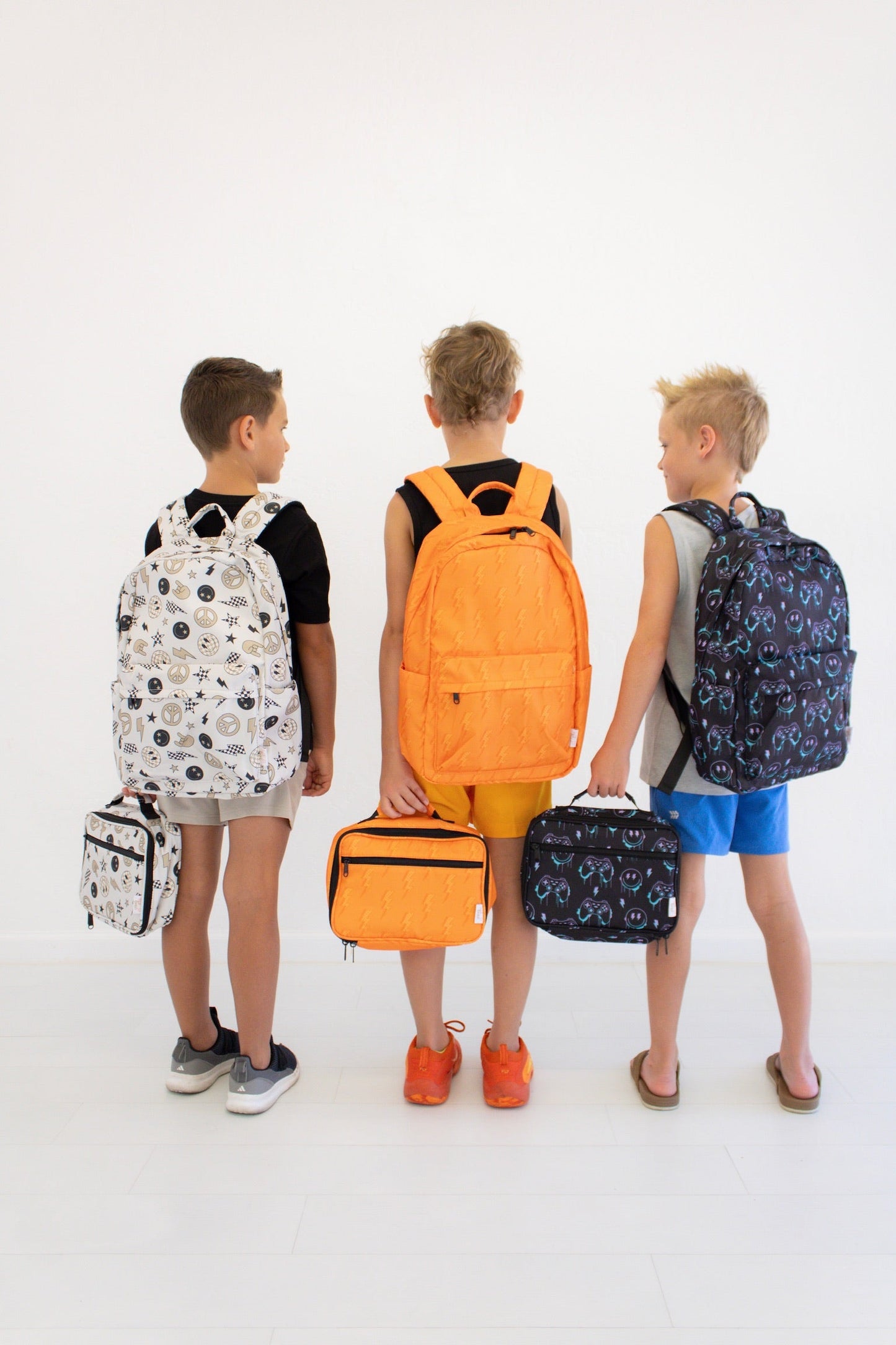 Niveau supérieur - Sac à dos et boîte à lunch